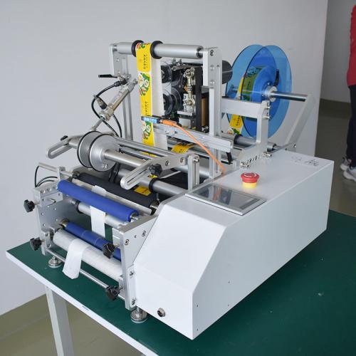 Semi-automatic round bottle labeling machine
